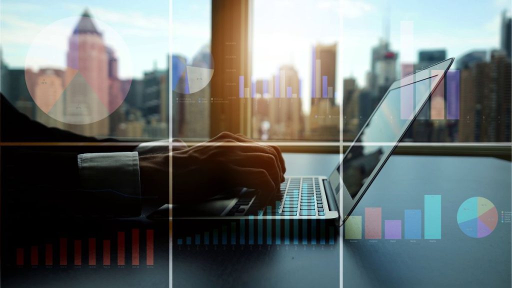 Budgeting on laptop in city office_1200x675