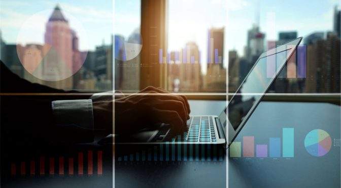 man using laptop to budget